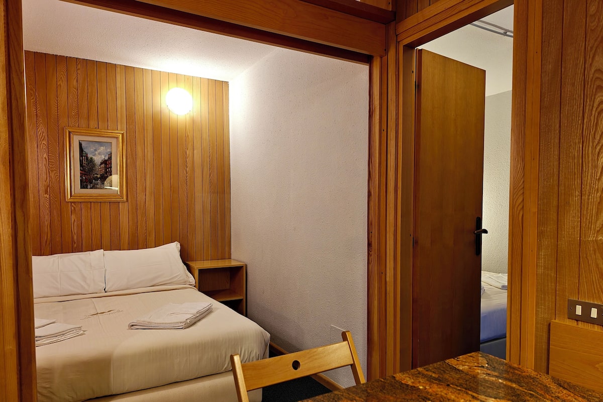 Apartment | Living area | 28-inch flat-screen TV with satellite channels