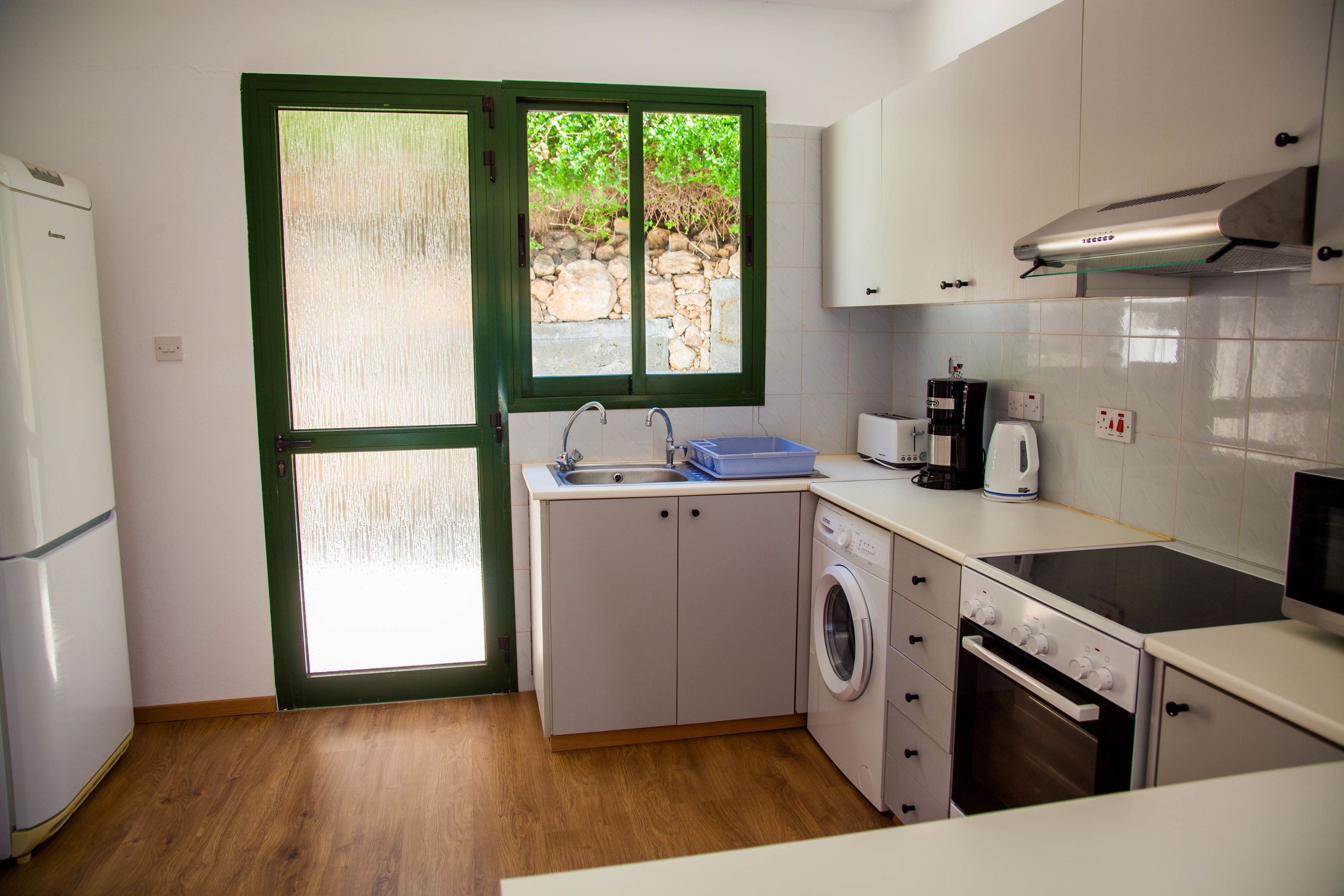 exclusive townhome, 2 bedrooms, ocean view | private kitchen | fridge, microwave, oven, stovetop