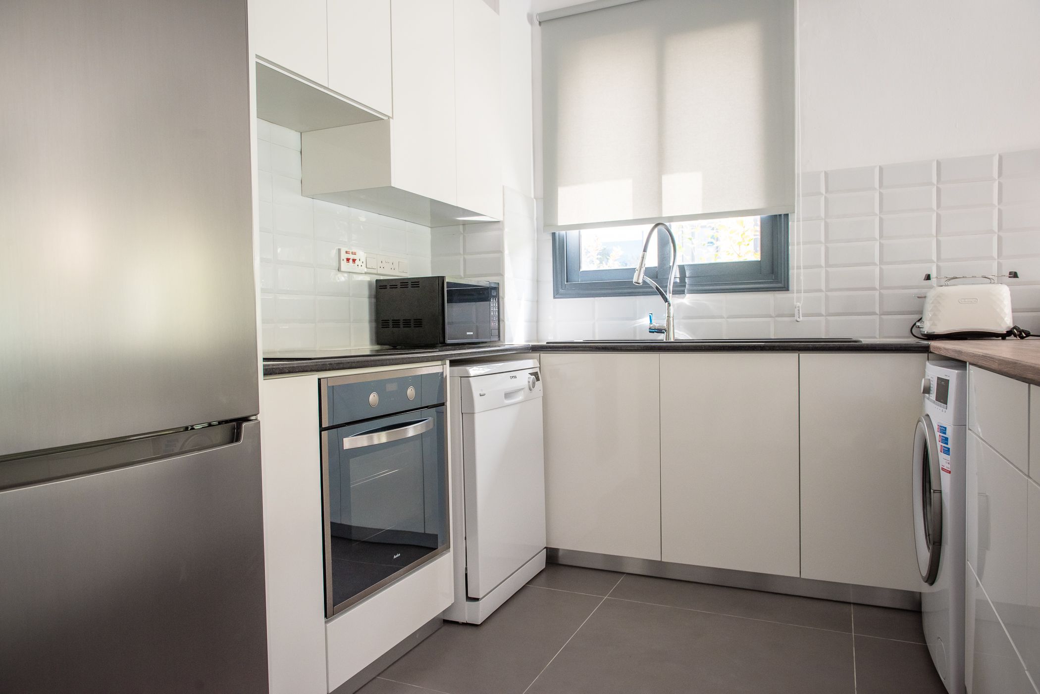 luxury townhome, 3 bedrooms | private kitchen | fridge, microwave, oven, stovetop