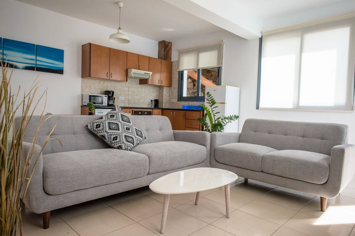 Apartment, 1 Bedroom, Sea View (Split Level) | Living area | Smart TV