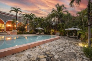 Outdoor pool, pool umbrellas, sun loungers