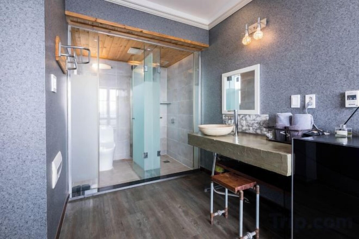 Bathroom | Shower, designer toiletries, hair dryer, slippers