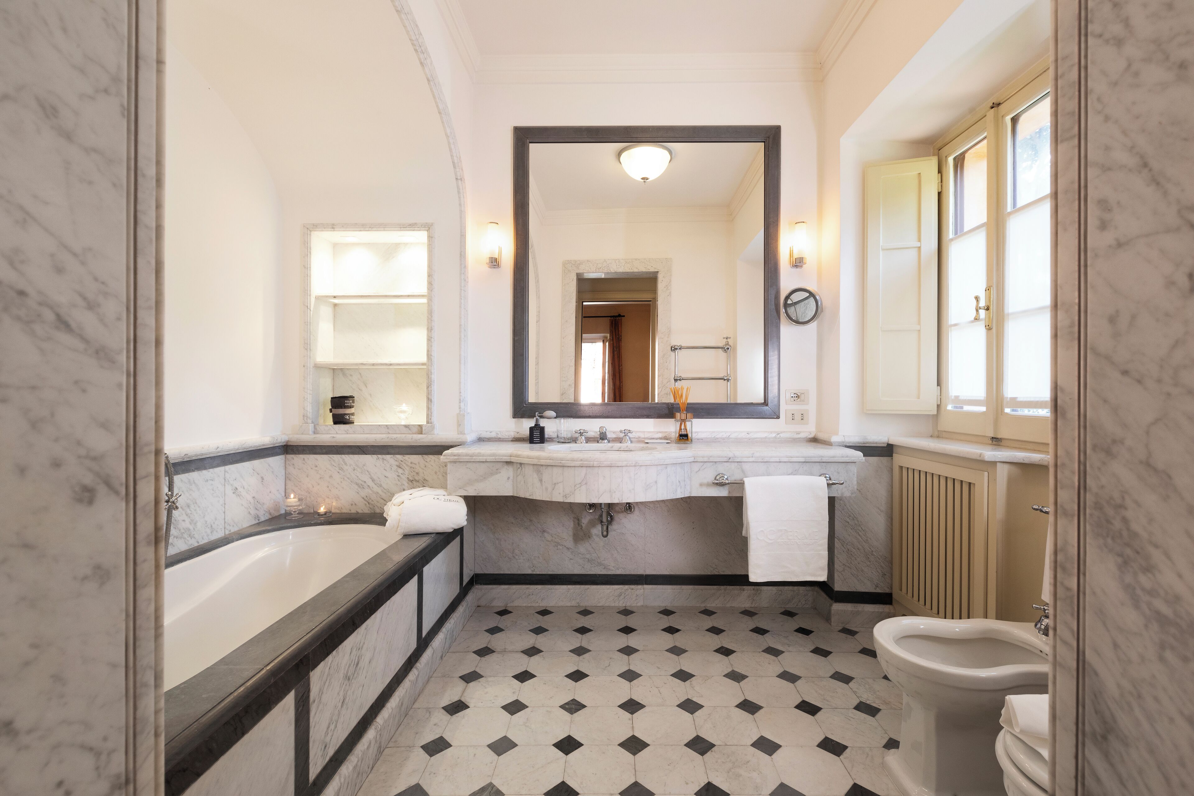 suite | bathroom | eco-friendly toiletries, hair dryer, bathrobes, slippers
