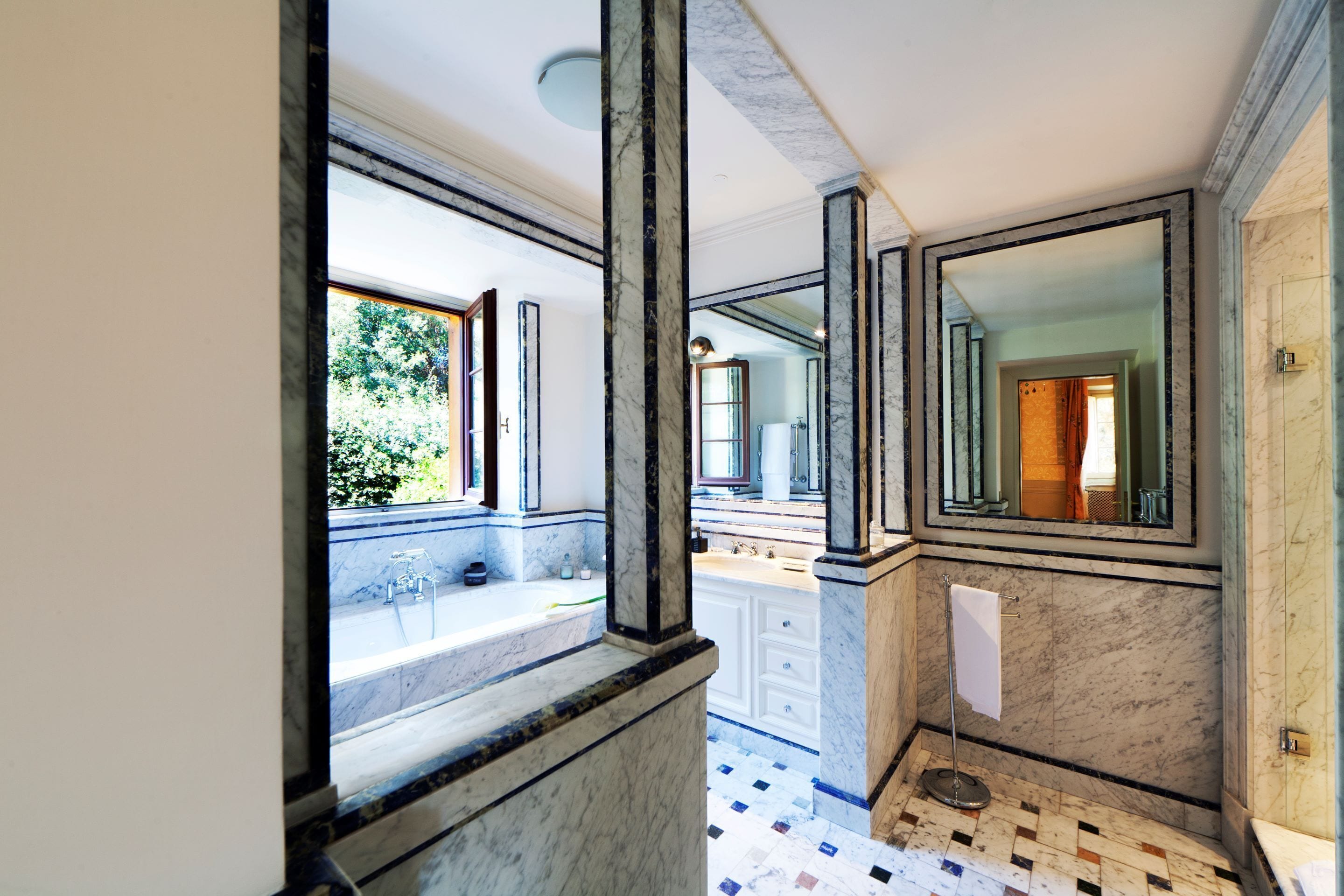 superior studio suite | bathroom | eco-friendly toiletries, hair dryer, bathrobes, slippers