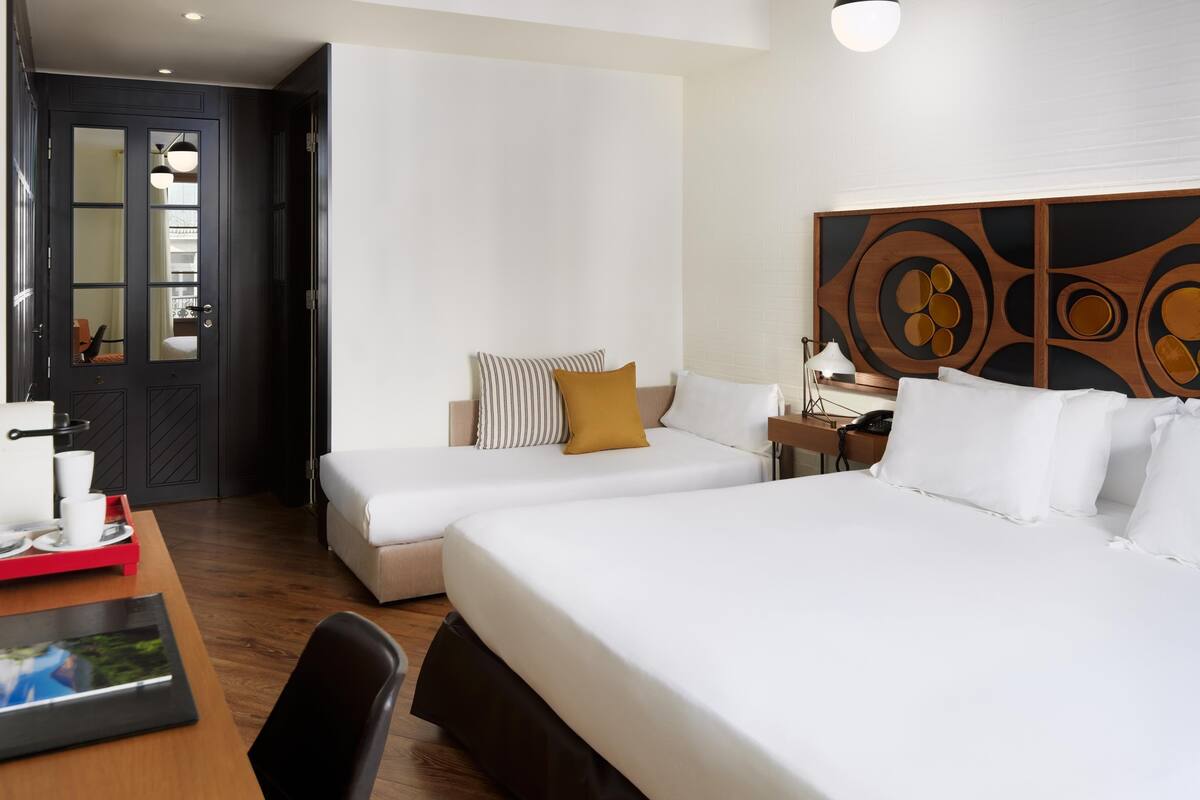 Premium bedding, down comforters, minibar, in-room safe