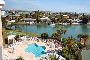 Outdoor pool, open 9:00 AM to 10:00 PM, pool loungers
