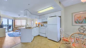 Premier Condo | Private kitchen | Full-size fridge, microwave, oven, stovetop