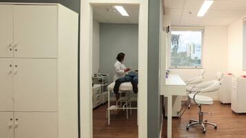 Patients receive expert care in this well-equipped dental clinic with a dedicated reception area.