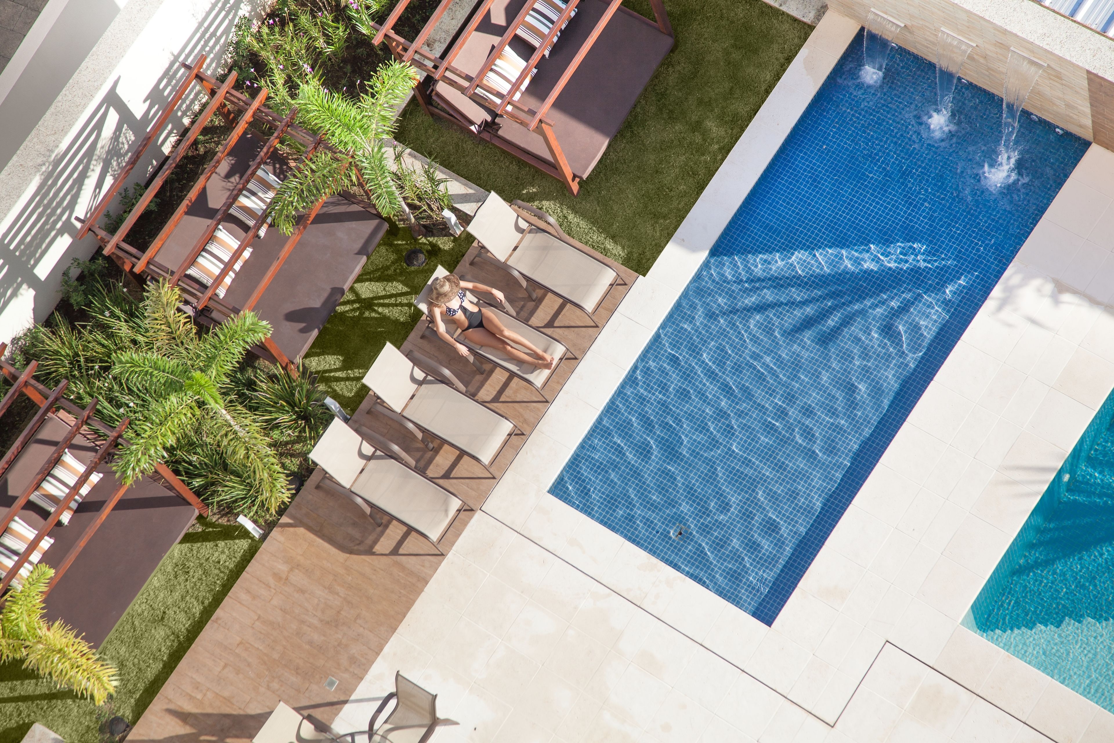 outdoor pool, pool umbrellas, pool loungers