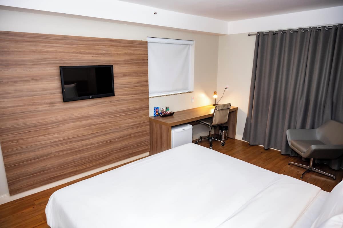 Superior Double Room | Minibar, in-room safe, desk, laptop workspace