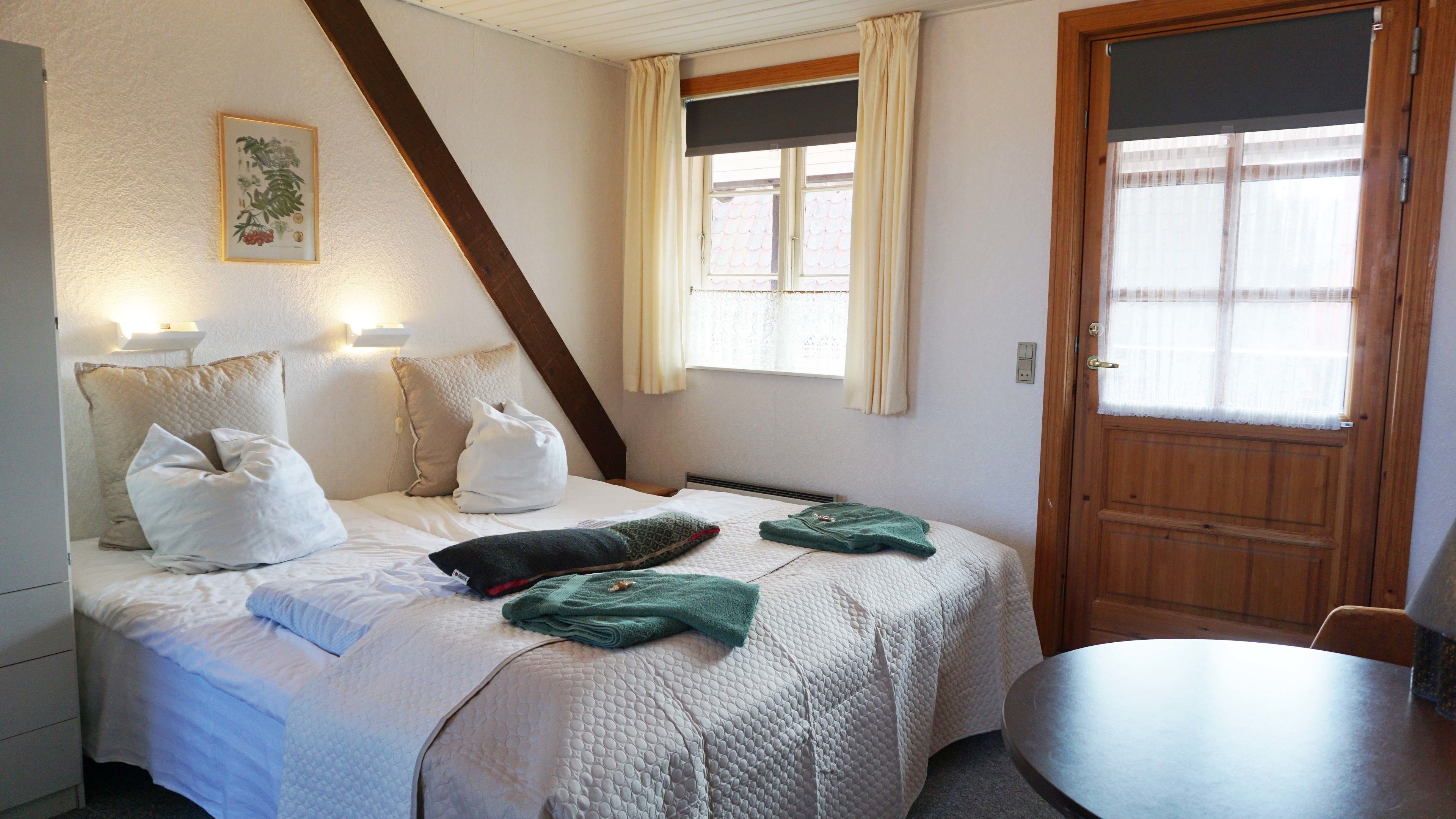 double room, private bathroom | individually decorated, individually furnished, blackout curtains