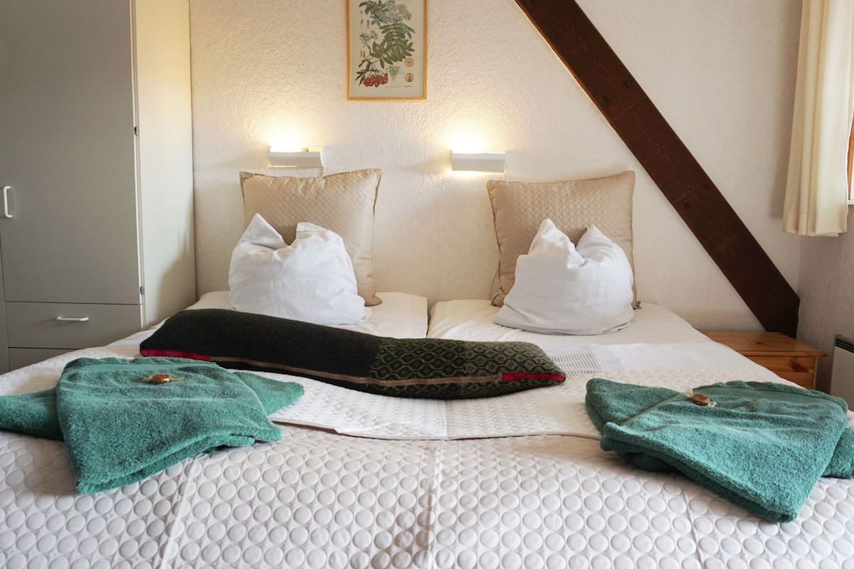 double room, private bathroom | individually decorated, individually furnished, blackout curtains