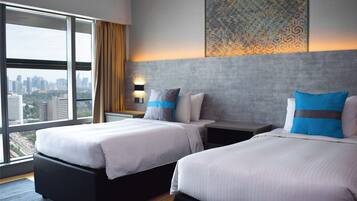 Superior Twin Room | Minibar, in-room safe, desk, laptop workspace