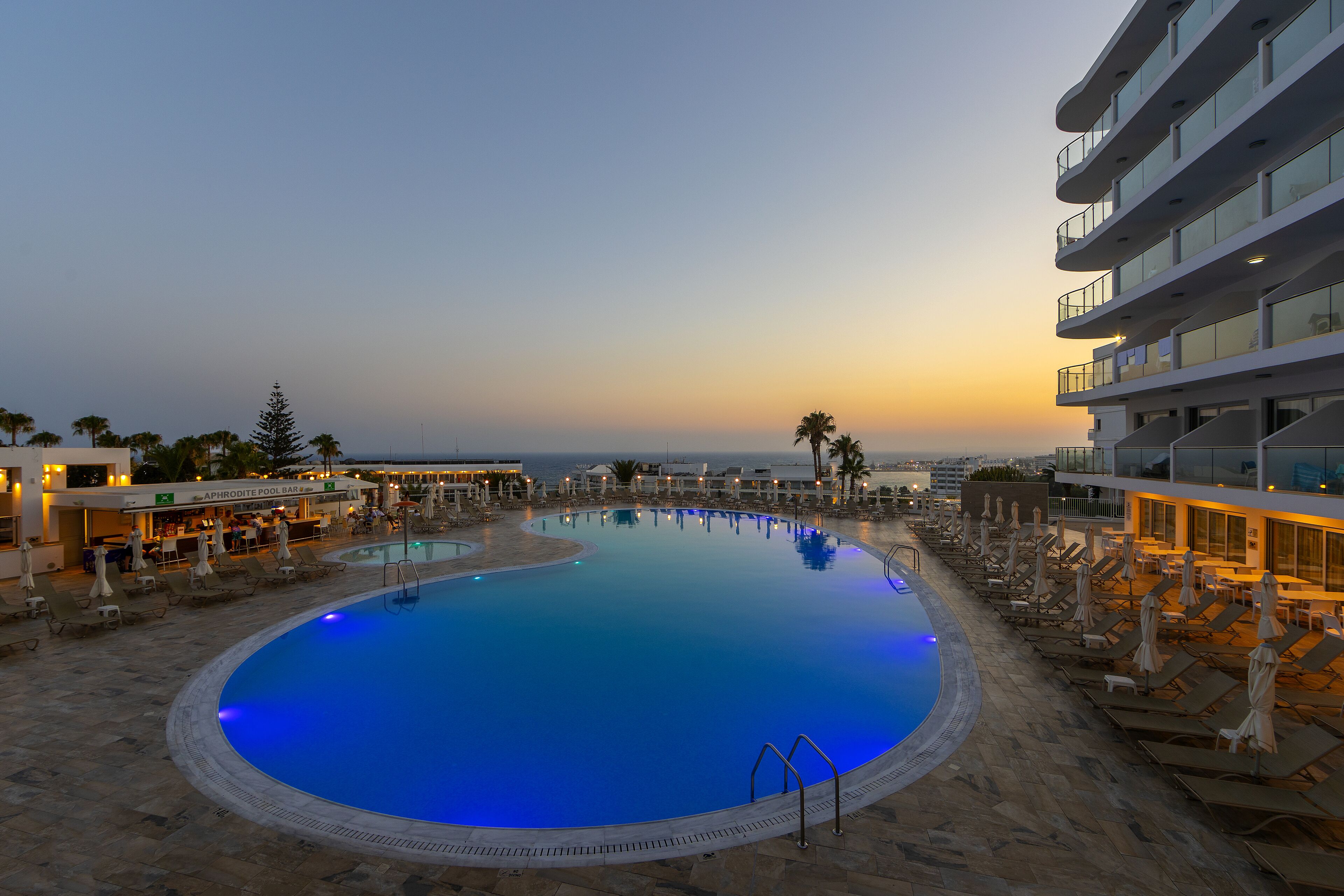 indoor pool, seasonal outdoor pool, pool umbrellas, pool loungers