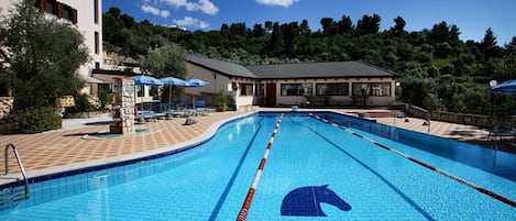 Seasonal outdoor pool, pool umbrellas, sun loungers