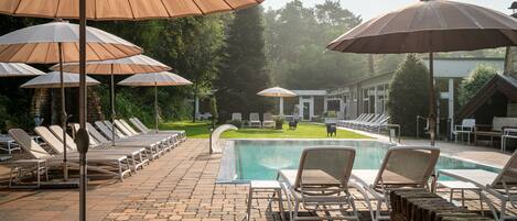 Indoor pool, outdoor pool, pool umbrellas, sun loungers