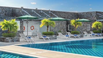 Outdoor pool, pool umbrellas, pool loungers