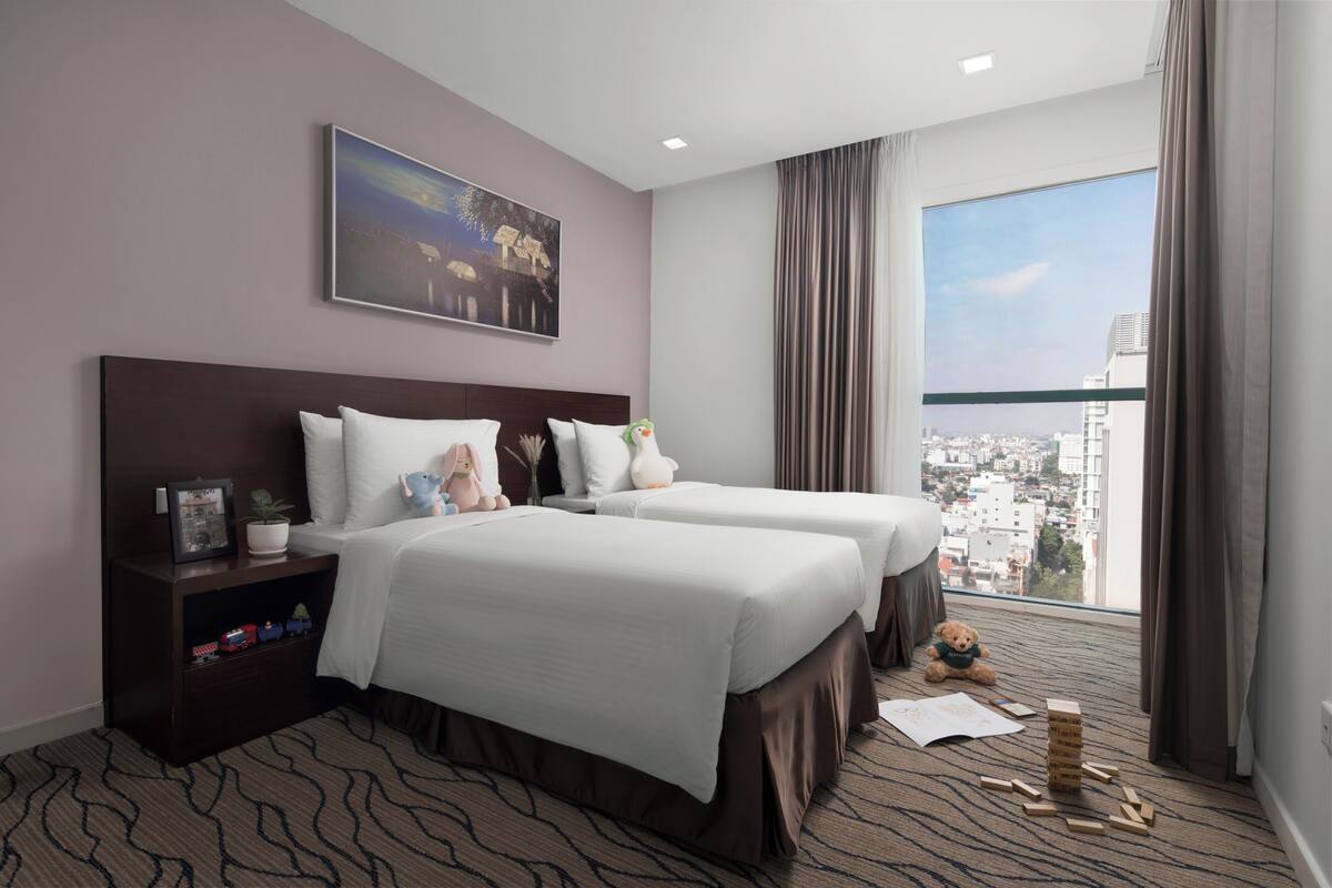ห้องดีลักซ์, 3 ห้องนอน, วิวเมือง | 1 ห้องนอน, ผ้าปูที่นอนฝ้ายอียิปต์, เครื่องนอนระดับพรีเมียม, มินิบาร์