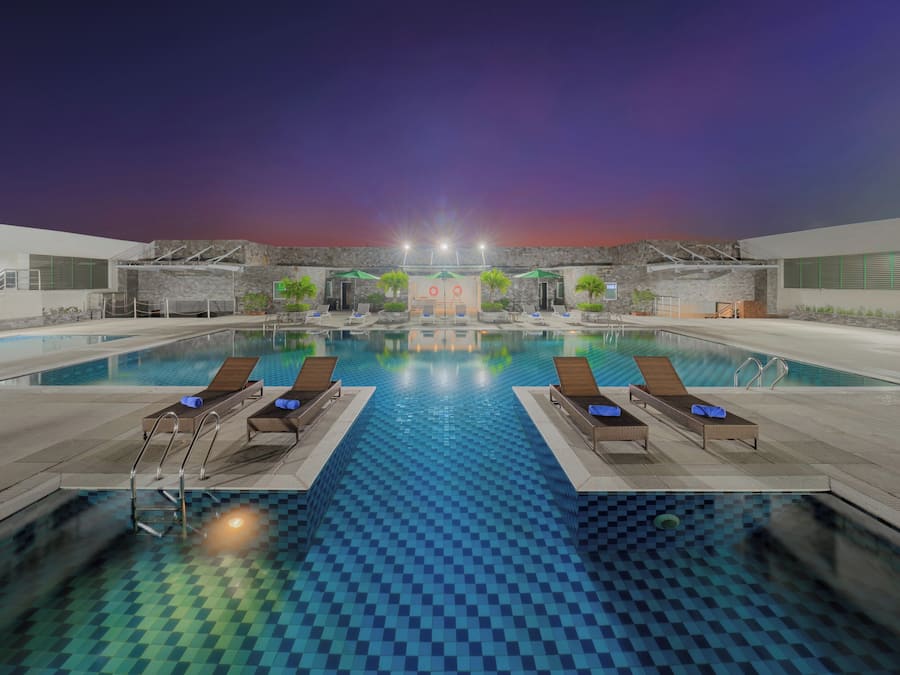Outdoor pool, pool umbrellas, pool loungers