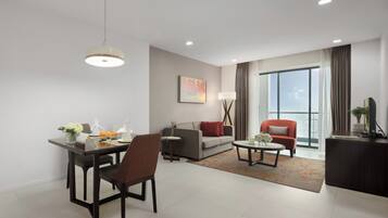 Executive Room, 1 Bedroom, City View | Living area | LCD TV, fireplace, DVD player