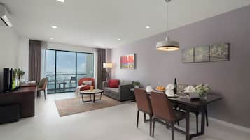 Premier Room, 2 Bedrooms, City View | Living area | LCD TV, fireplace, DVD player