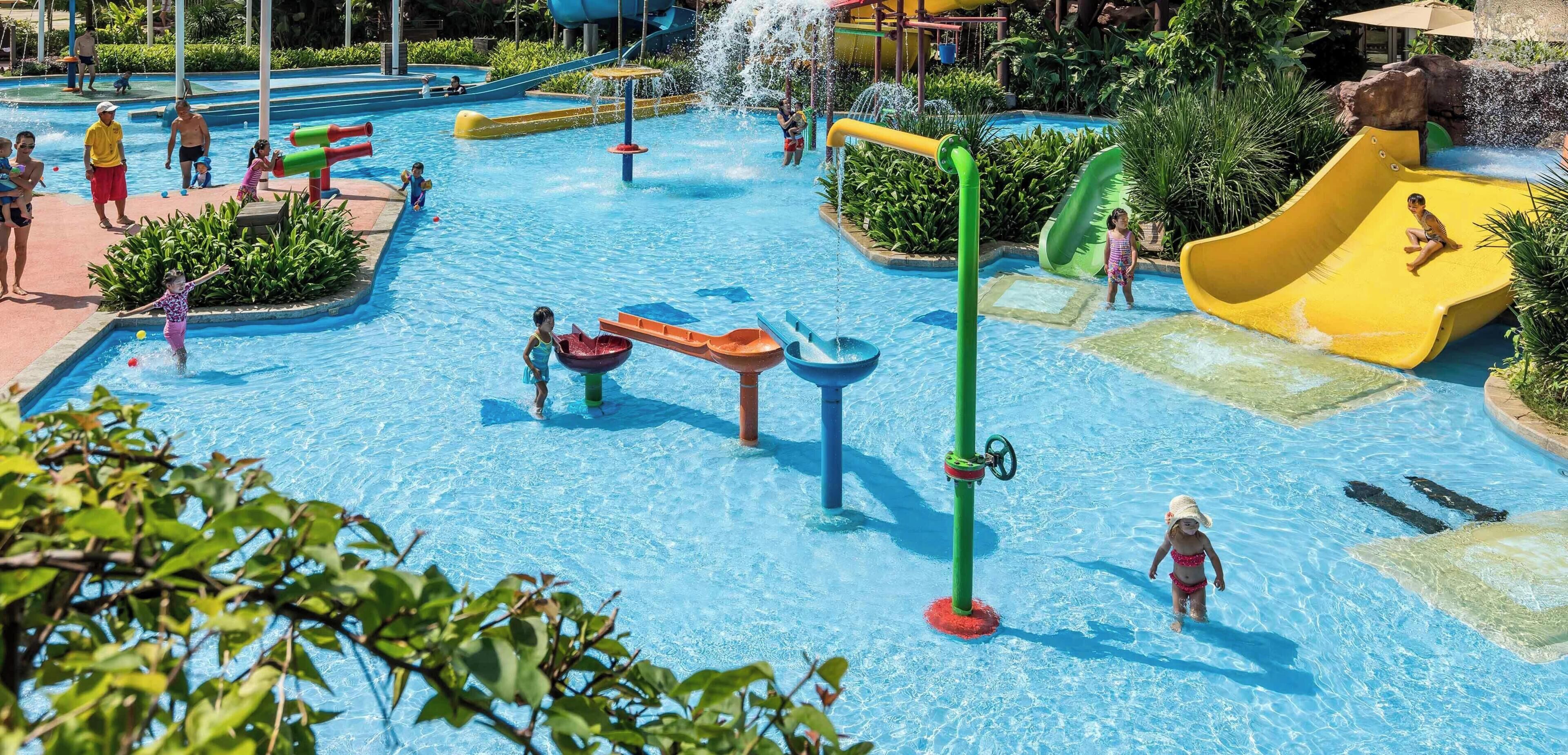 A water park with multiple slides and water play areas.