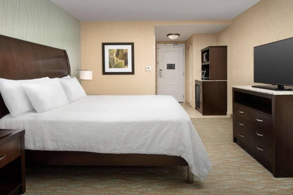 Hypo-allergenic bedding, in-room safe, blackout curtains