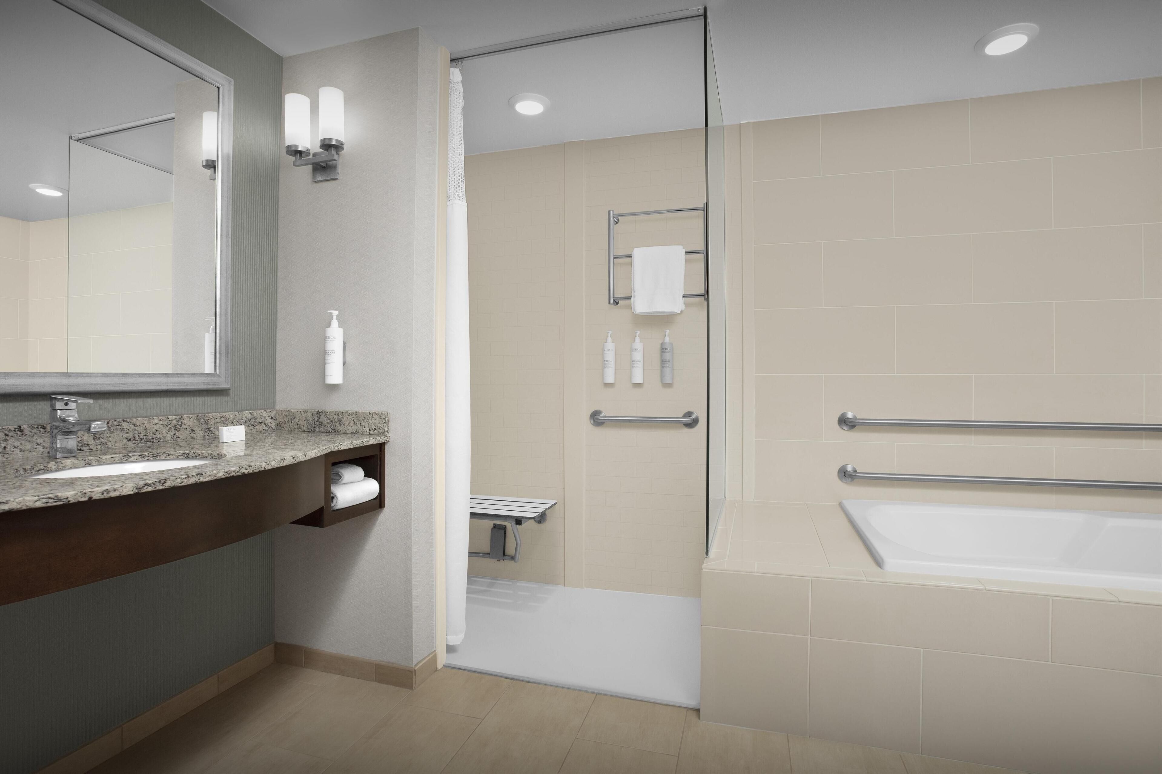 combined shower/bathtub, free toiletries, towels