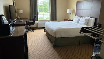 Premium bedding, desk, laptop workspace, blackout curtains