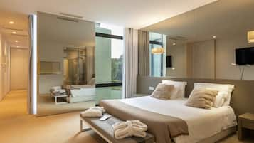 Master Suite | มินิบาร์, ตู้นิรภัยในห้องพัก, โต๊ะทำงาน, ผ้าม่านกันแสง