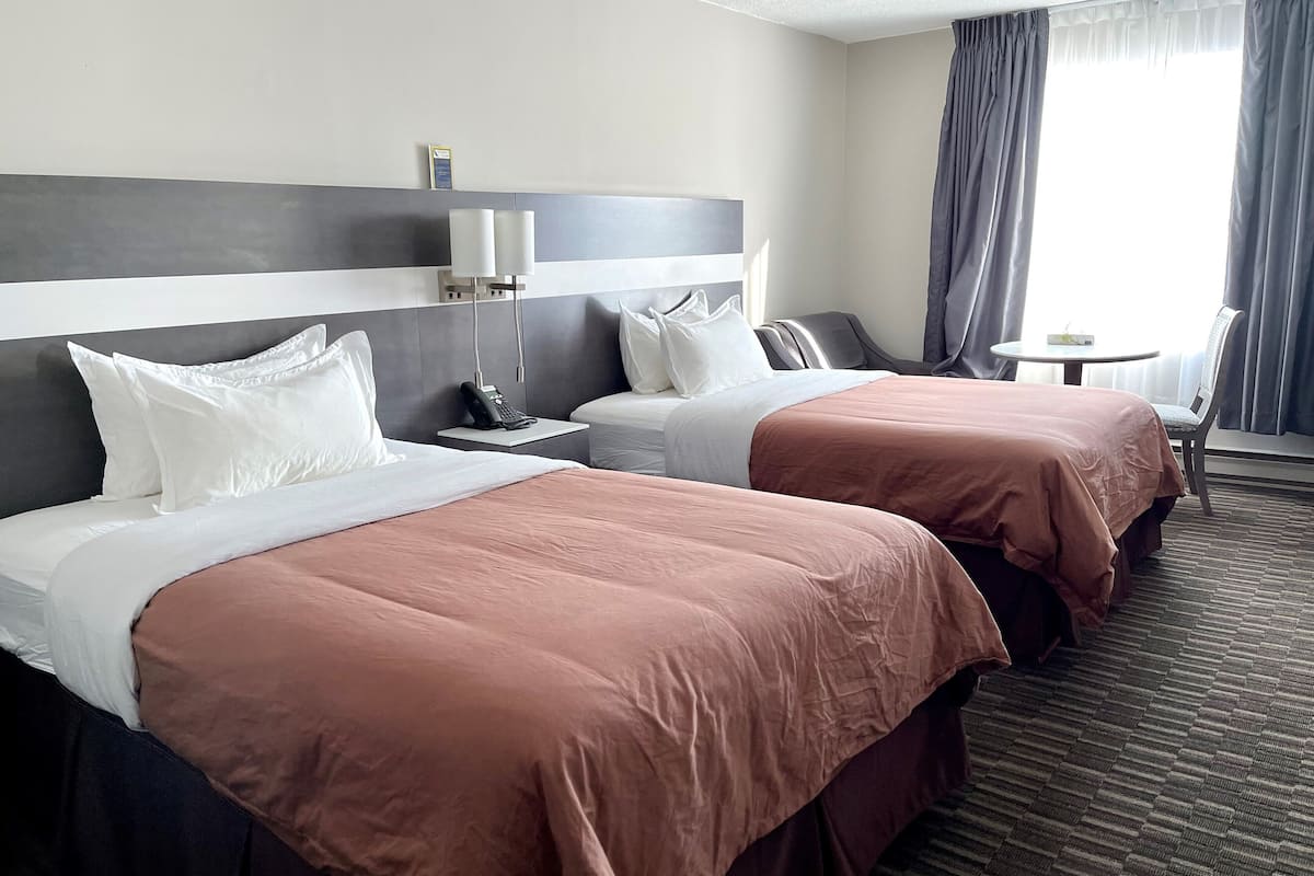 room, 2 double beds | desk, soundproofing, iron/ironing board, free wifi