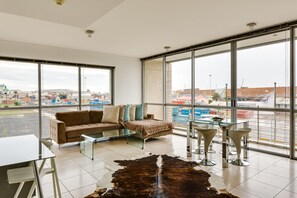 Standard Apartment, 2 Bedrooms | Living area | Flat-screen TV, DVD player - Harbour Bridge Luxury Apartments (Cape Town)