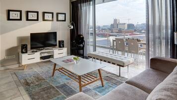 Standard Apartment, 2 Bedrooms | Living area | Flat-screen TV, DVD player