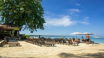 On the beach, white sand, beach shuttle, beach cabanas
