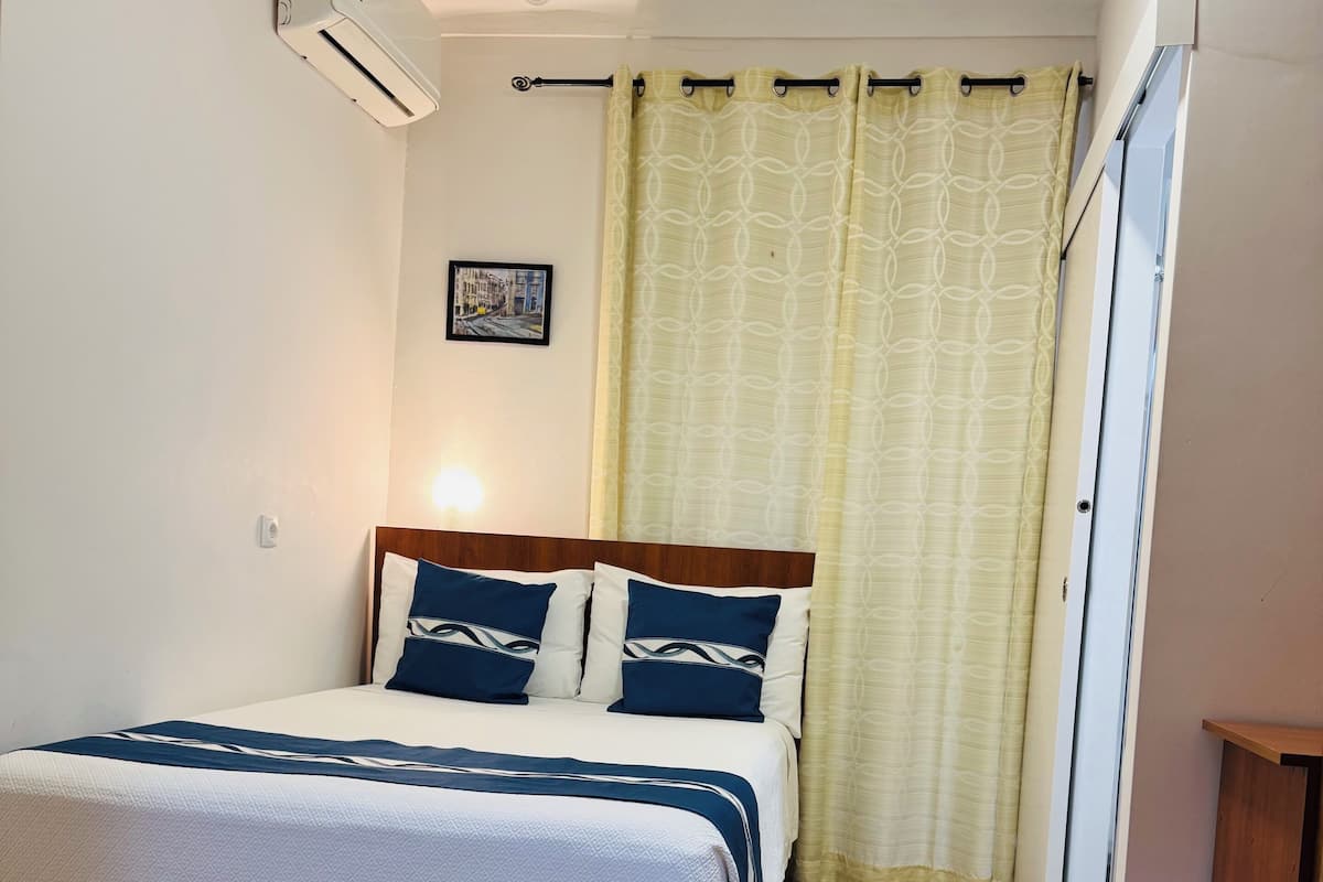 Double Room, Private Bathroom | In-room safe, blackout drapes, free WiFi, bed sheets