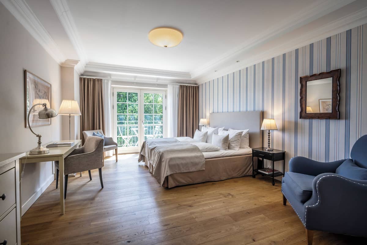 Premium bedding, desk, laptop workspace, iron/ironing board (on request)