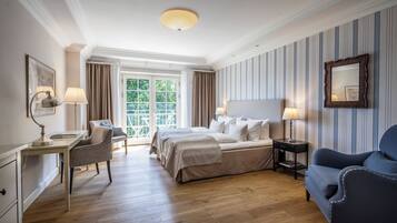 Premium bedding, desk, laptop workspace, iron/ironing board (on request)