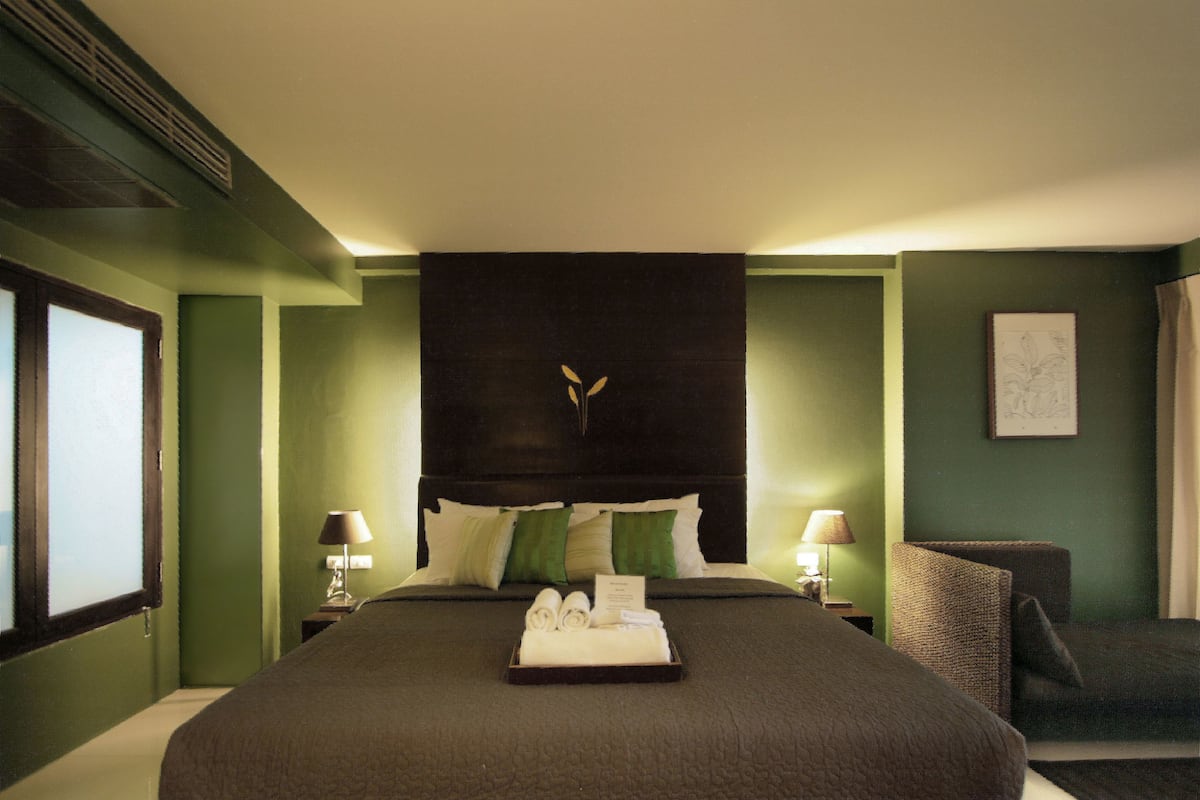 Suite, 1 King Bed, Balcony, Garden View | 1 bedroom, free minibar, desk, free WiFi