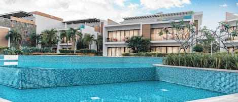 Outdoor pool, pool umbrellas, pool loungers