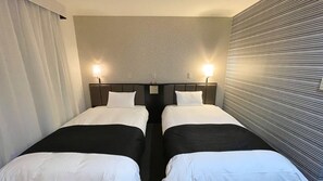 Twin Room, Non Smoking | Blackout drapes, iron/ironing board, free WiFi, bed sheets