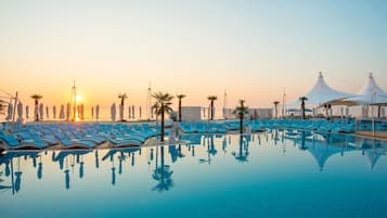 Indoor pool, 11 outdoor pools, open open 24 hours a day, pool umbrellas