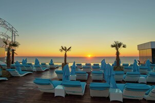 Indoor pool, 11 outdoor pools, open open 24 hours, pool umbrellas
