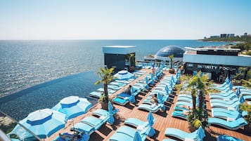 Indoor pool, 11 outdoor pools, open open 24 hours, pool umbrellas
