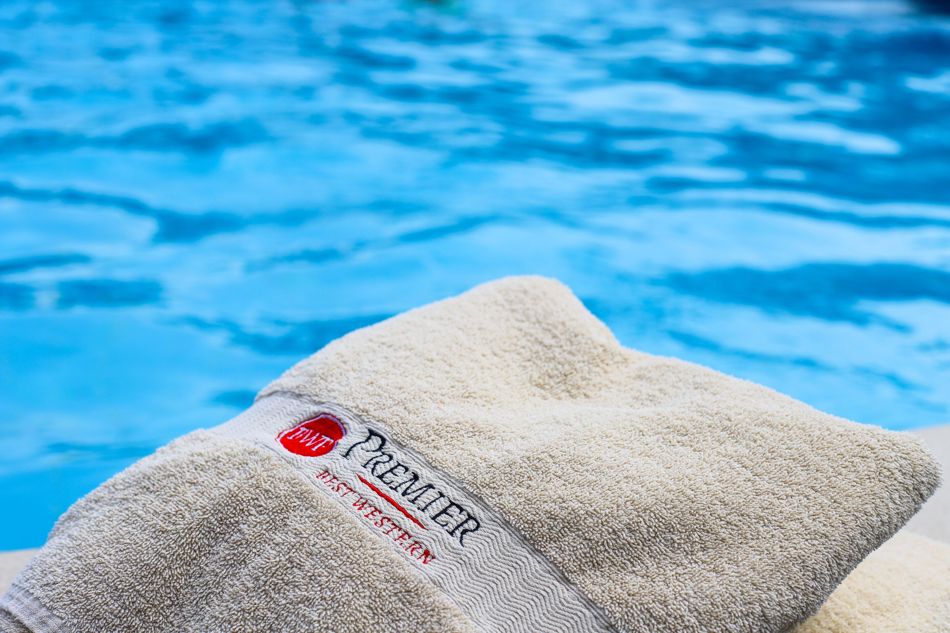 A towel with a label reading "Premier West End."