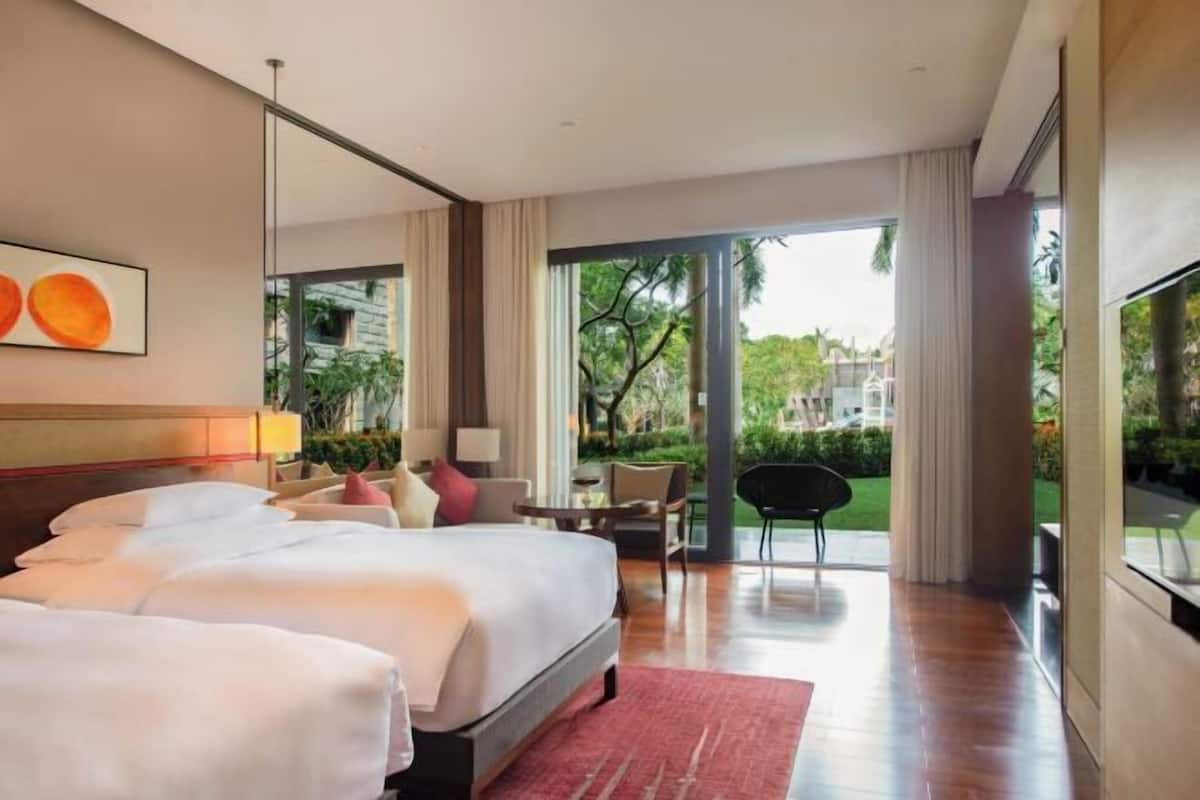 Luxe beddengoed, een minibar, een kluis op de kamer, een bureau