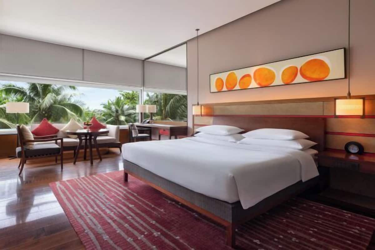 Luxe beddengoed, een minibar, een kluis op de kamer, een bureau