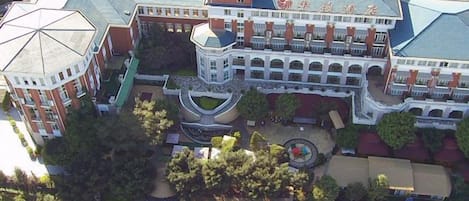 A large building with multiple wings and a central courtyard.