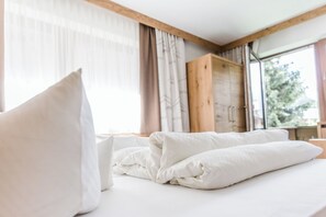 羽毛の掛け布団、セーフティボックス (室内)、客室ごとに異なるインテリア、WiFi (無料)