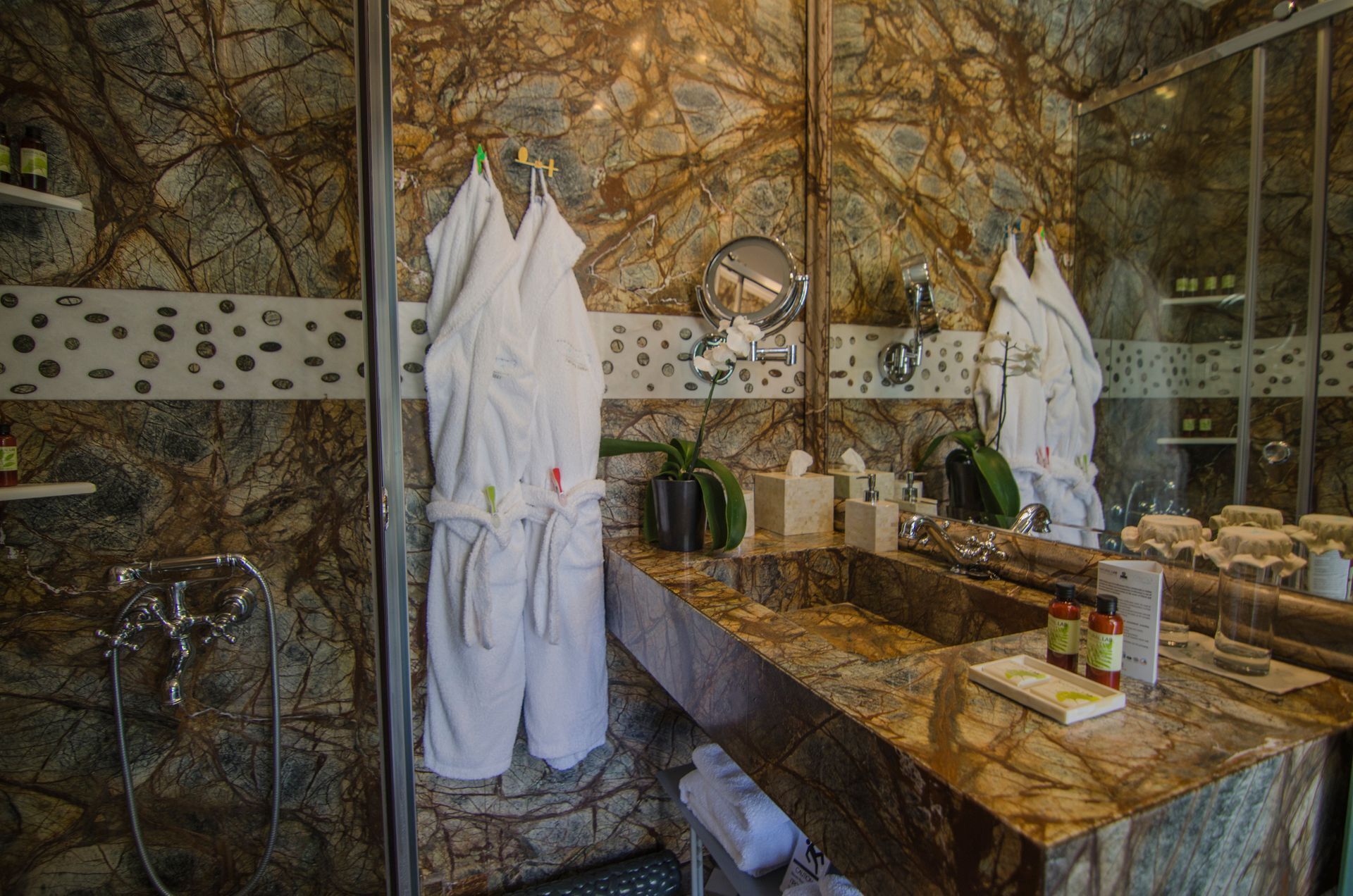 senior suite | bathroom | designer toiletries, hair dryer, bathrobes, slippers