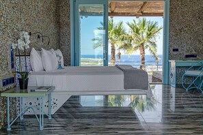 Designer toiletries, hair dryer, bathrobes, slippers